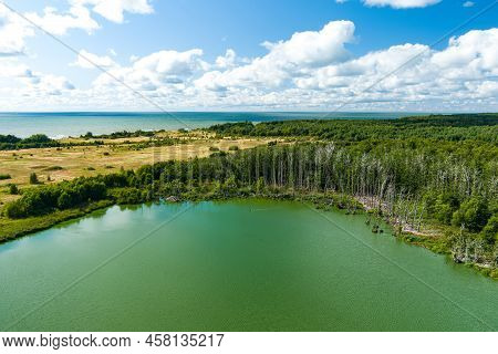 Beautiful Aerial View Of Lake Plaze In Klaipeda District, Where Bird Lovers Can Watch The Lake's Wat