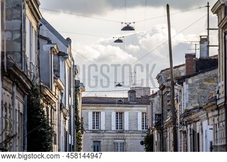 Selective Blur On Facades Of Typical Old French Residential Buildings In Bordeaux, France, Made Of F