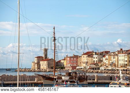 Piran, Slovenia - September 17, 2021: Panorama Of  Piran With Adriatic Sea In Front, With Blue Water