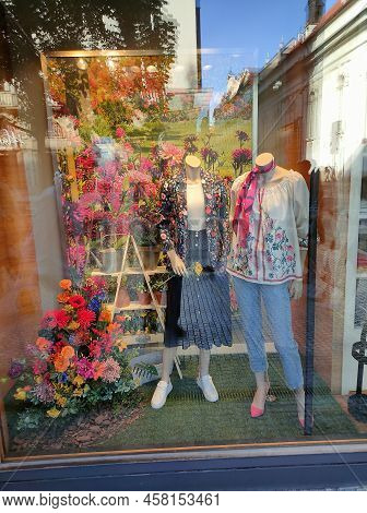 Shopwindow With Women's Clothing And Shoes In Prague, Czech Republic