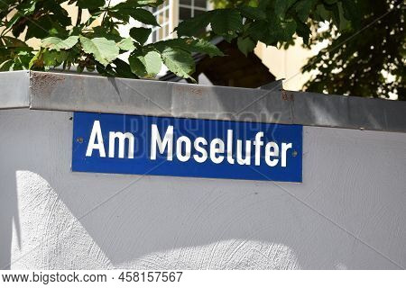 Winningen, Germany - 07 12 2022: Street Name Sign \'am Moselufer\'