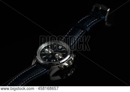 Studio Shot Of A Blue Fancy Luxury Unbranded Men Watch On The Black Background. Stainless Steel Man'