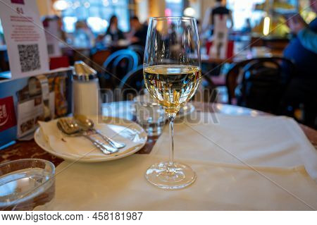 Lifestyle Of Vienna, Glass Of White Dry Austrian Wine Served In Old Viennese-style Cafe In Vienna, A