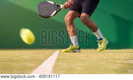 Acticing Paddle Sport On The Outdoor Court. Man Teaching Padel Class