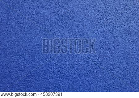 Surface Of Wall With Coarse Vibrant Blue Roughcast Finish