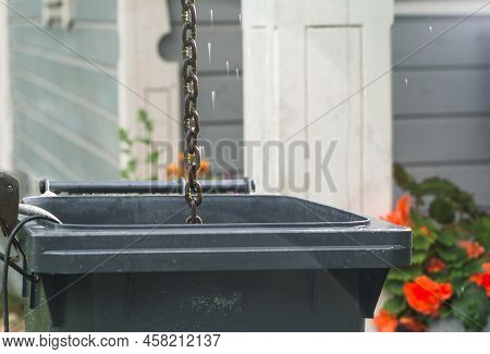 Rainwater Tank Or Water Barrel, Collection And Use Of Rainwater For Watering Plants