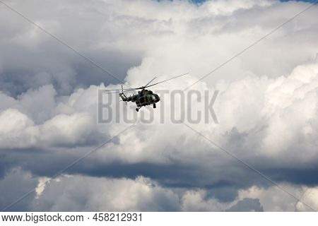 Russian Military Helicopter Mi-8 (nato Codification: Hip) In Flight On White Clouds Background