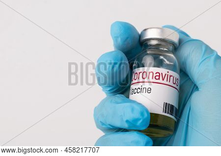 Scientist Researcher Holds Covid-19 Vaccine In His Hand. Studying Virus To Discover Treatment For Co