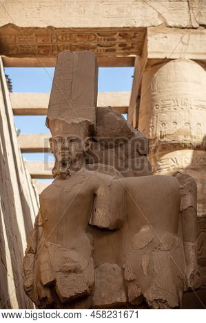 Karnak, Luxor Region Egypt - 09.07.2020: Statues Of Ancient Egyptian Pharaohs And Gods. Various Hier