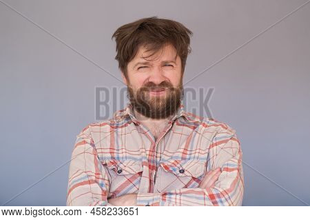 Man With Unhappy Expression As Feels Frustration, Being Upset To Hear Bad News
