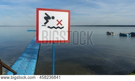 No Diving Sign At Beach, Lake Naroch, Belarus. Warning Sign Of Shallow Water. Warning Notice Sign Do