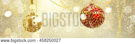 Golden Christmas Balls Garland On Glowing Golden Background, Web Banner Format