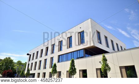 Office Building With White Aluminum Composite Panels. Facade Wall Made Of Glass And Metal. Abstract 