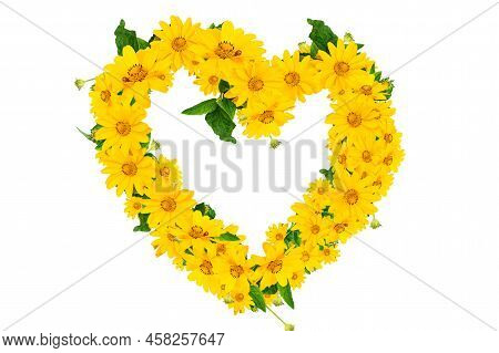 Yellow Flowers Arrangement In Heart Shape Isolated On White Background Top View. Negative Space