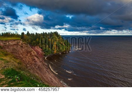 Russia. Vologda Region. Autumn Colors On The Southeastern Shore Of Lake Onega Near The Mouth Of The 
