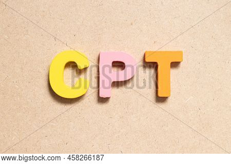 Color Alphabet Letter In Word Cpt (abbreviation Of Carriage Paid To) On Wood Background