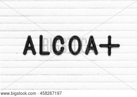 Black Color Letter In Word Alcoa+ On White Felt Board Background