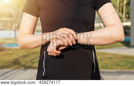 Woman Using Fitness Tracker For Walking Steps, Running Distance Or Heart Rate Monitoring. Healthy Li