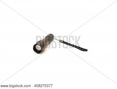 Close-up Lotus Head Shape Of Black Aluminum Alloy Flashlight With Lanyards Handle Isolated On White