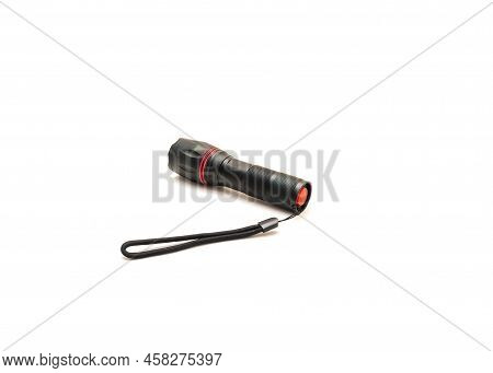 Side View Of Black Aluminum Alloy Flashlight With Lanyards Handle Isolated On White Background