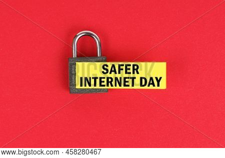 Business And Security Concept. On The Red Surface There Is A Lock With A Sticker With The Inscriptio