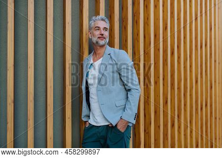 Portrait Of Uccessful Happy Businesswoman Wearing Causal Clothes And Sunglasses In Summer In Street 