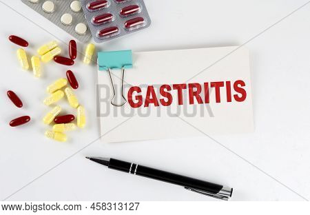 Gastritis Text Written In Card With Pills. Medical Concept.