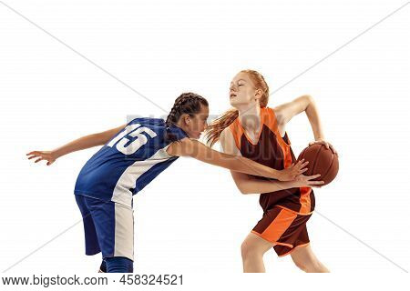 Two Basketball Players, Young Girls, Teen Playing Basketball Isolated On White Background. Concept O