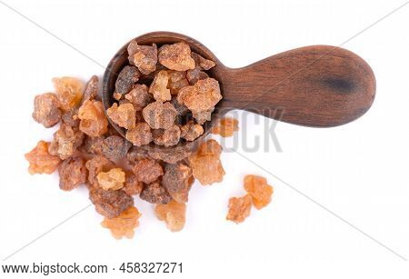 Myrrh Resin In Wooden Spoon, Isolated On White Background. Pile Of Natural Commiphora Myrrha. Sweet 
