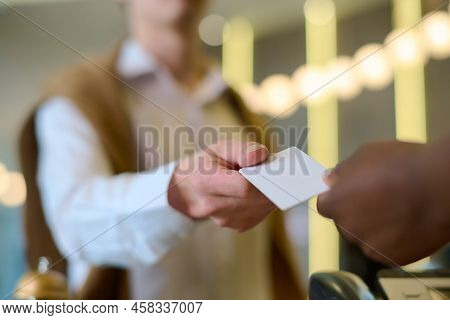 Hand Of Young Male Travler Or Guest Of Hotel Taking Keycard On Reception