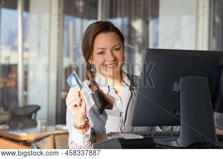 A Restaurant Worker Registrating New Order By Cash-register To The Client Of The Hotel Restaurant. T