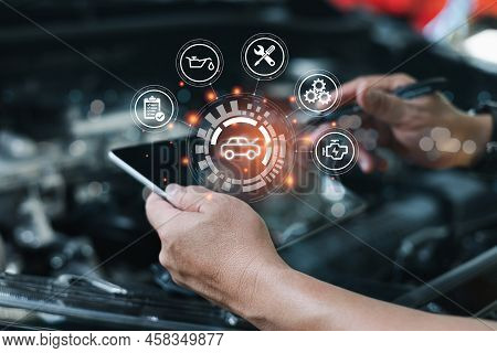 Car Business Concept And Technology On Virtual Screen, Serviceman Working Onsite Use Tablet Check Se