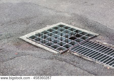 Grille Drain Of Sewer Around The Street Or Walkway . Water Recirculation System. Wastewater Treatmen