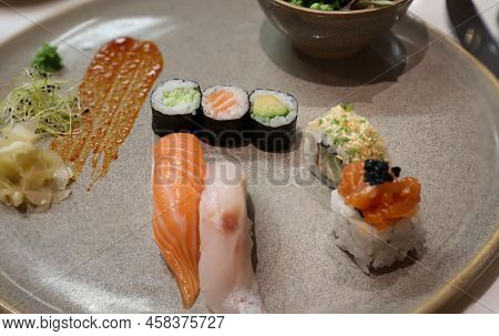 On A Plate Lies Prepared Fresh Sushi.