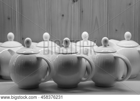 Many Coffee Pots Stand Side By Side In One Compartment.