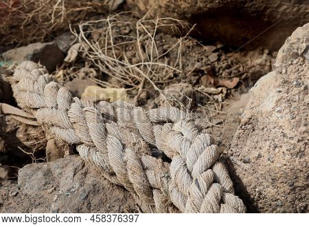 A Carelessly Thrown Away Old Rope From A Cutter, Ship.