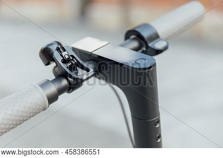 Electric Scooter Handle Bar With Smart Display On Grey Background