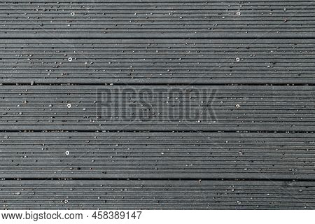 Top View Of The Texture Of Wood-plastic Composite Decking Board.