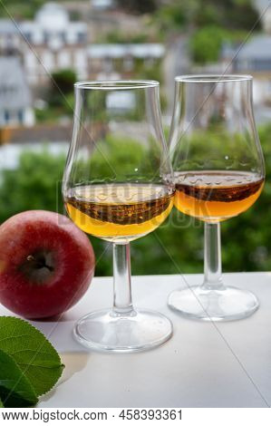 Tasting Of Strong Alcoholic Drink Calvados Made From Apples In Normandy, Calvados Region, France