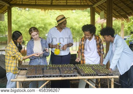 Group Of Mixed Race Students And Teacher Learning Agriculture  Technology In Smart Farming , Educati