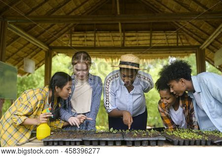 Group Of Mixed Race Students And Teacher Learning Agriculture  Technology In Smart Farming , Educati
