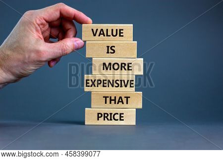 Price Or Value Symbol. Wooden Blocks With Concept Words Value Is More Expensive That Price. Beautifu