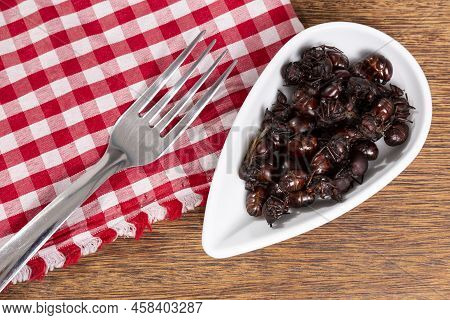 Ants Culonas Typical Gastronomy Of Santander Colombia; Photo On Wood Background