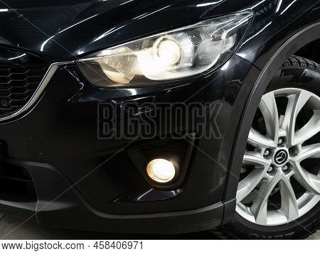 Novosibirsk, Russia - February 10, 2022:   Mazda Cx-5,  Close Up Of The Car Headlights. Exterior Clo