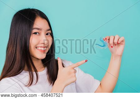 Portrait Young Asian Beautiful Woman Smiling Pointing With Finger Silicone Orthodontic Retainers For