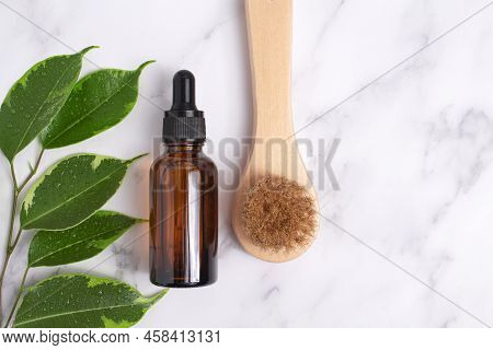 Unbranded Serum Bottle And Anti-cellulite Brush For Dry Body Massage. Organic Scin Care. Prevent Cel