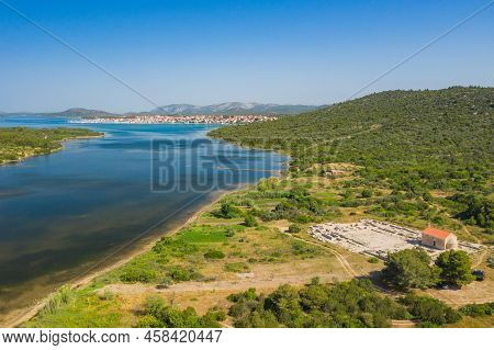 Ivinj Archeological Site With Saint Martin Church And Town Of Pirovac In Background, Croatia