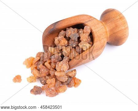 Myrrh Resin In Wooden Scoop, Isolated On White Background. Pile Of Natural Commiphora Myrrha. Sweet 