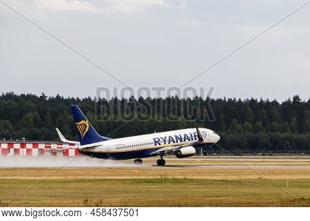 Ryanair Boeing 737-8as Takes Off From The Runway At Riga International Airport. Riga International A