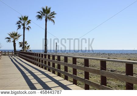 Nobody At Litoral Wooden  Footpath In  Saint Peter Beach In Marbella, Andalusia, Spain.